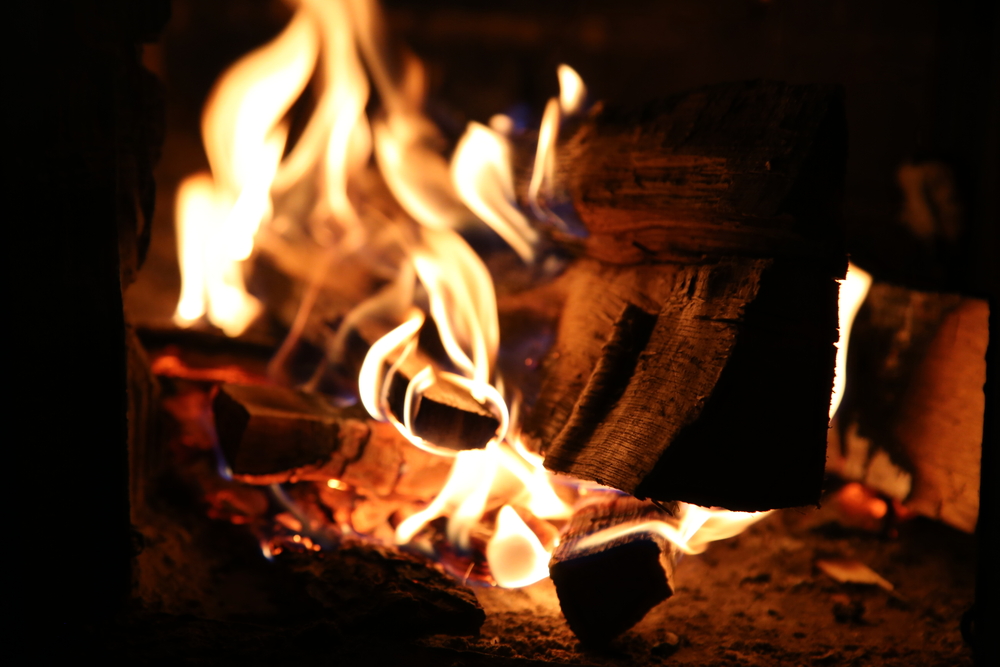 Burning,Wood,In,The,Stove,Close-up,And,Red,Coals.flames.