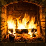 Burning,Firewood,In,Fire-box,Of,Fireplace,In,Country,Cottage.,Rustic