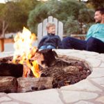 View,Of,Firepit,And,Happy,Smiling,Family,Of,Two,,Father