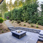 New,Modern,Home,Features,A,Backyard,With,Rectangular,Concrete,Fire